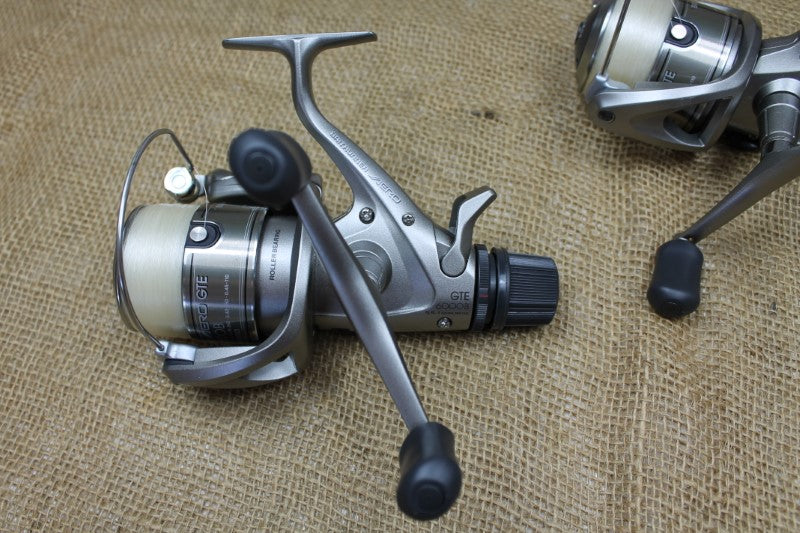 2 x Shimano Baitrunner GTE 6000B Carp Fishing Reels + 2 Spare Spools.