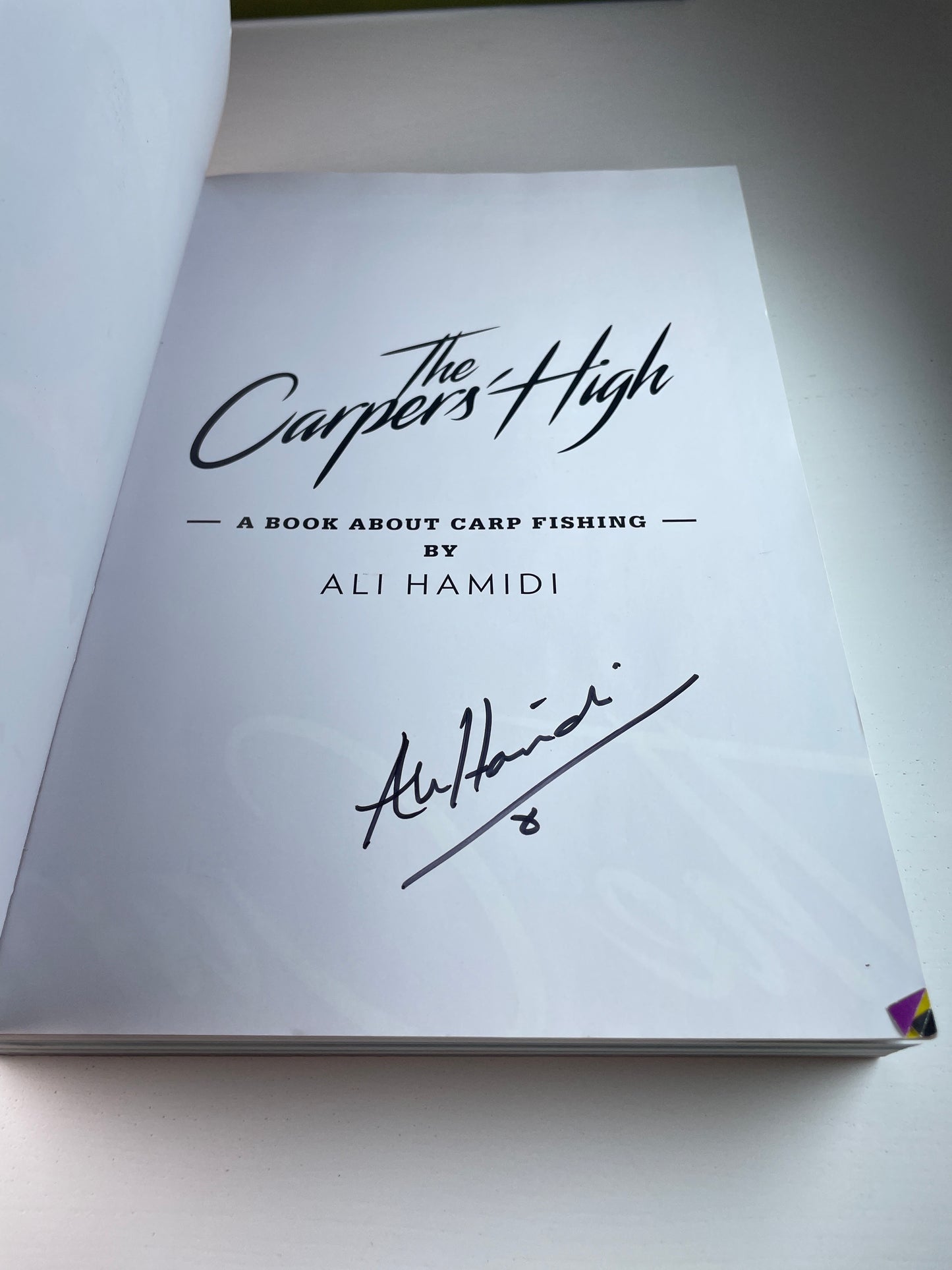 The Carpers’ High by Ali Hamidi. 2015. Signed. Carp Book.