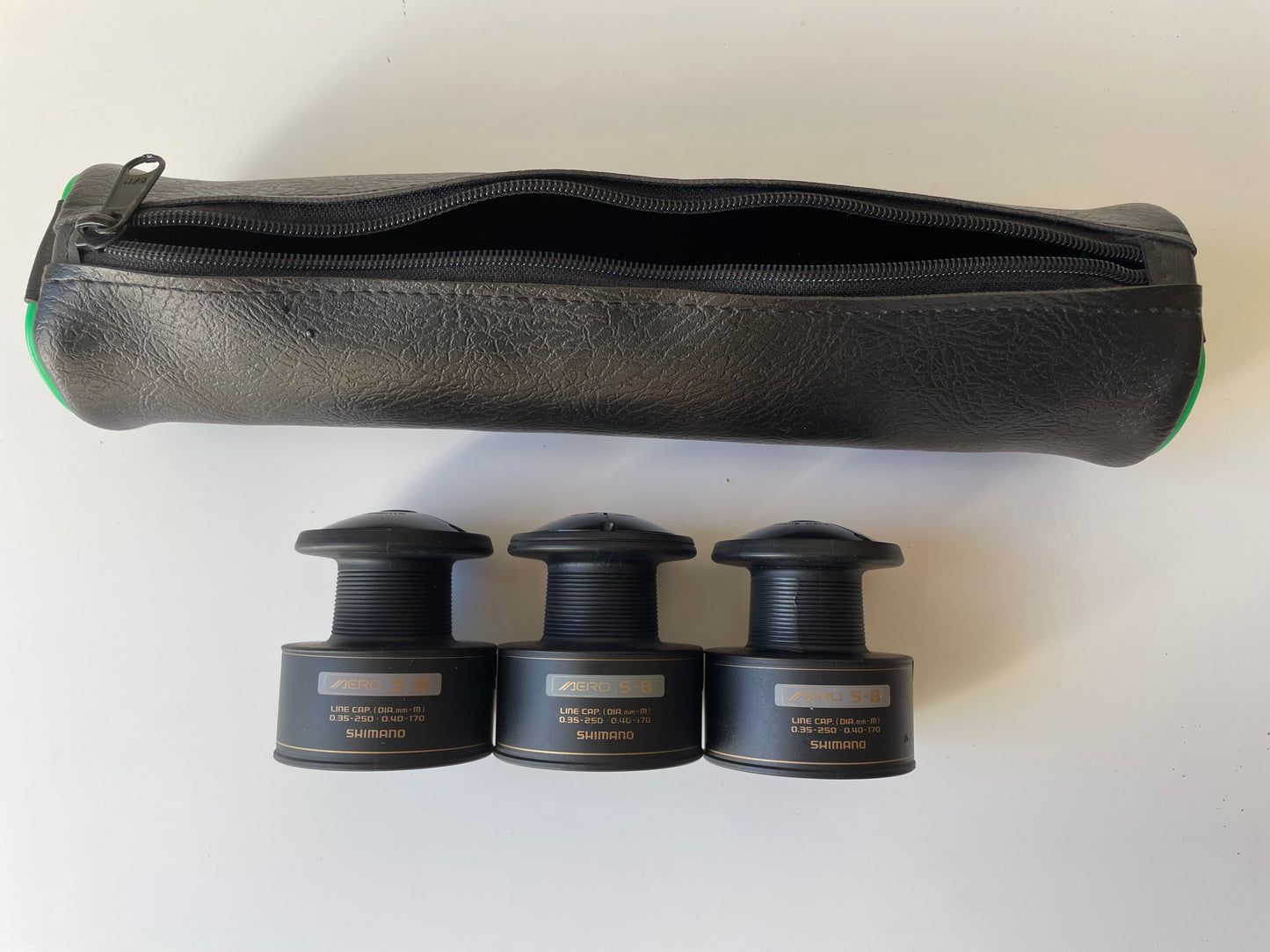 3 x Shimano Aero 6010-8010Baitrunner Spools With Zip Case. 1990s.